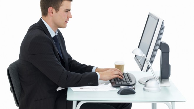 man-sitting-at-office-desk-working.jpg@protect,0,35,951,803@crop,658,370,c